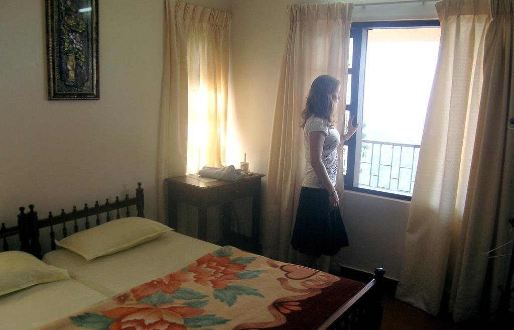ムンナールグリーン マジック ホームアパートメント 部屋 写真